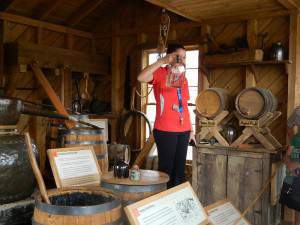 tour guide hiding behind a jug..cute and knowledgeable