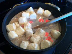 Brewing up a couple pounds of swedish fish, a pound of salt water taffy, some old marshmallows and some brown sugar (just in case it wasn't enuf...)