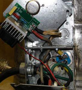 How it's wired.  Black directly to the element.  Green grounds to the still.  White connects to the SCR.  The SCR out to the element.  I ran the white through the ammeter to measure the amperage.  I connect the voltmeter to the element to measure the voltage.