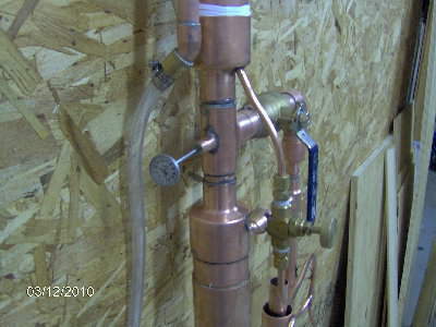 Side view of the valving and thermometer port, I use a #3 cork and pinched the 3/8&quot; i.d tube to keep it from being pushed in.<br />&gt;&gt;Thermometer has been replaced with a digital read unit.&lt;&lt;