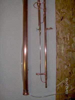 Lower end of the liebig and parrot tube outlet into collector leg.