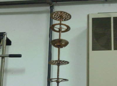 Heres the thre types of plates attached to a 1/4&quot; solid copper rod. There are 8 levels of alernating &quot;plates&quot;.  The strainer type plates get 1&quot; of glass marbles on top.