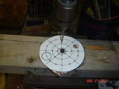 place on block of wood for drilling